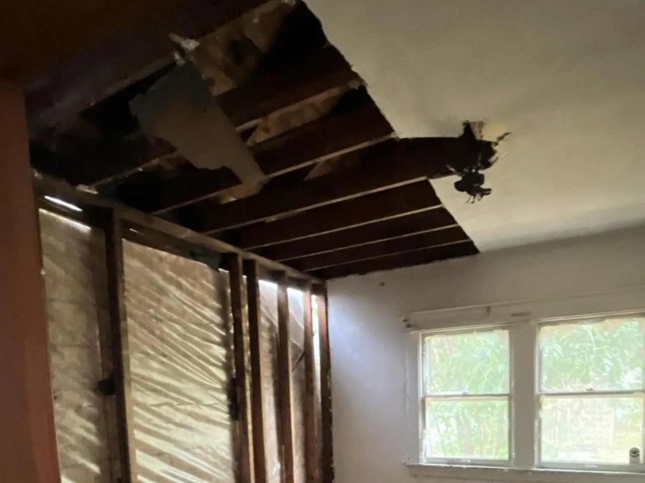 Water-Damaged Bedroom Rebuild — before